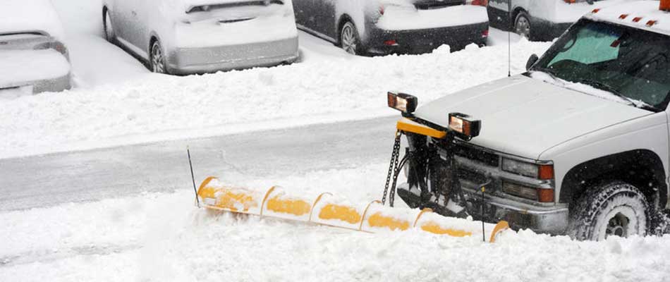 48477461 - snowplow removing snow on the street after blizzard